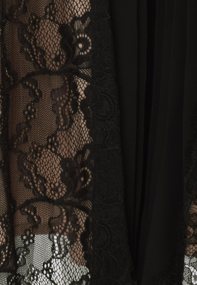 Plisowana spódnica z elementami kronki