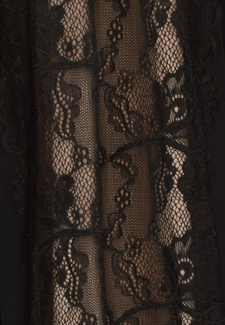 Plisowana spódnica z elementami koronki