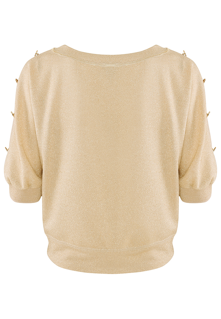 Elegancka złota bluzka z ozdobnymi guzilami na ramionach