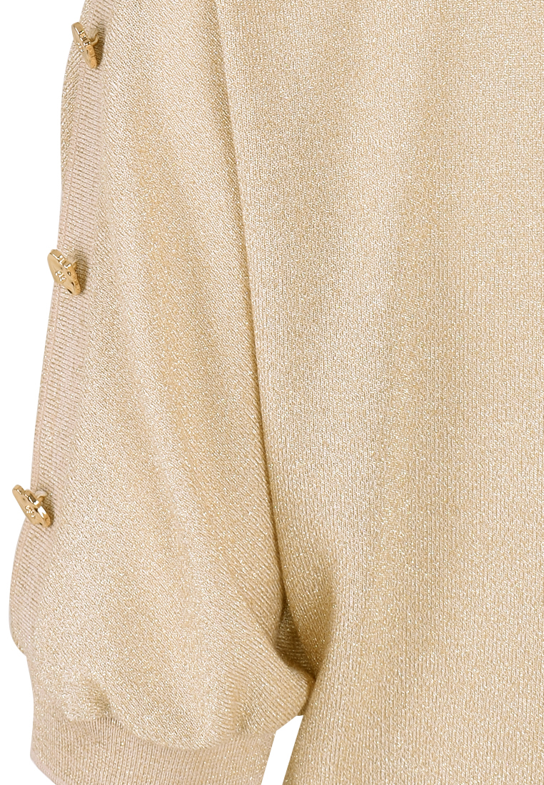 Elegancka złota bluzka z ozdobnymi guzikami na ramionach