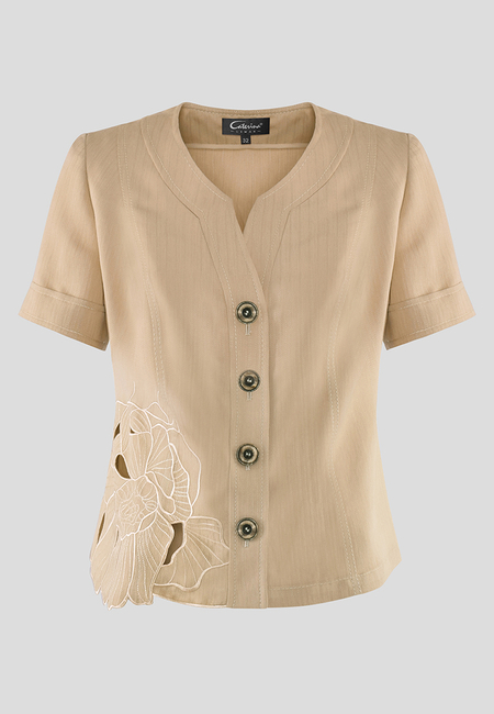 Beżowa bluzka z haftowanym kwiatem