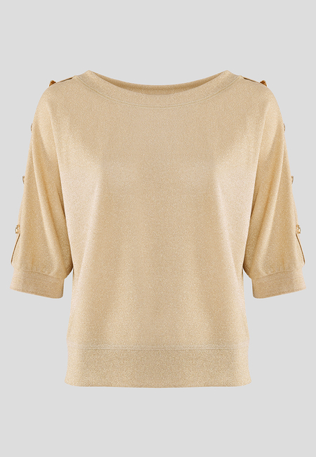 Elegancka złota bluzka z ozdobnymi guzilami na ramionach